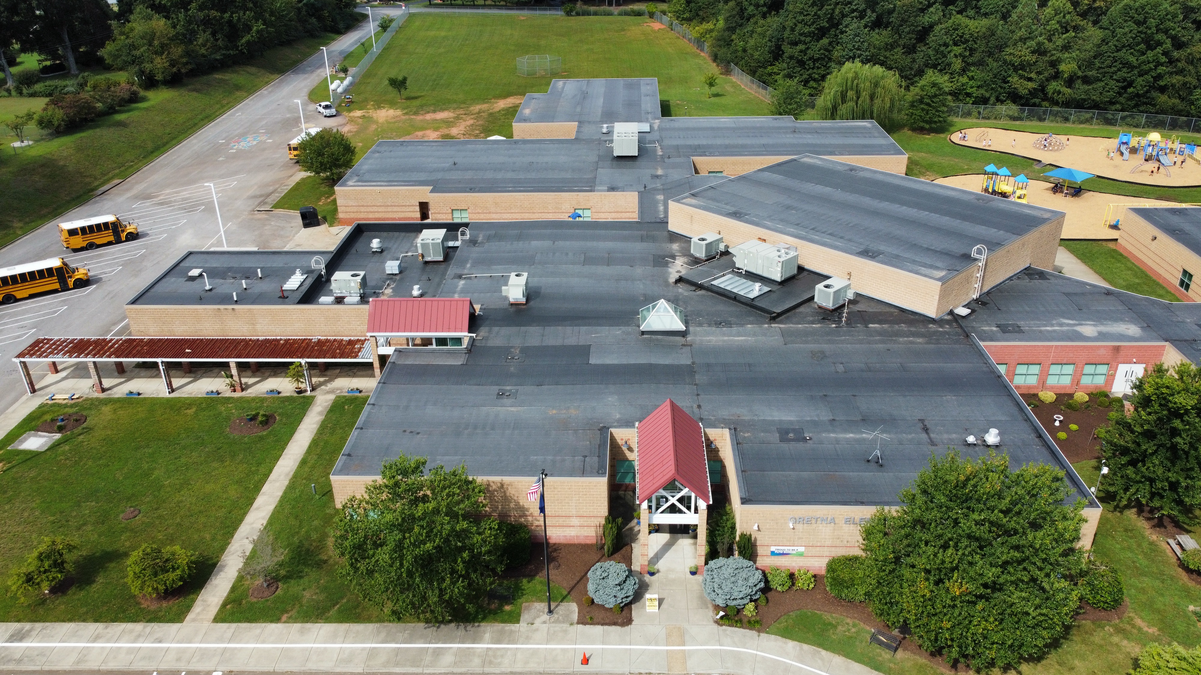 School Roofing Charlotte NC | CMS, UNC Charlotte, Davidson, Queens University